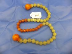 A string of Chinese jade and carnelian prayer beads