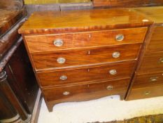 A Regency mahogany and satinwood strung chest of four long graduated drawers on bracket feet