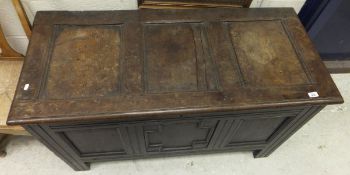 An 18th Century oak coffer,