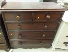 A 19th Century stained pine chest of two short over three long drawers with mother of pearl