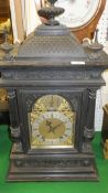 A circa 1900 ebonised cased mantel clock,