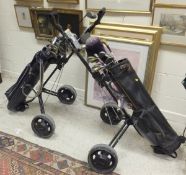 Two bags of golf clubs,