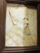 AFTER GEORGE FRAMPTON (1860-1928) "Study of bearded priest in cassock", plaster relief,