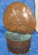 A Newlyn School copper wall pocket with arched spiked top,