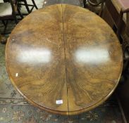 A Victorian burr walnut loo table on quadruped base