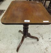 A 19th Century mahogany rectangular topped tilt-top occasional table,