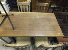 An oak plank top table purchased from Harrods,