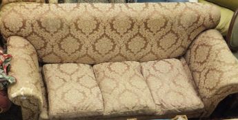 A circa 1900 upholstered drop end scroll arm sofa