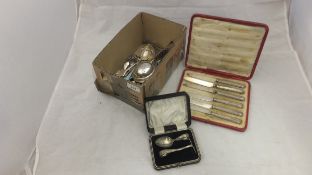 A box of miscellaneous silver and silver plated wares to include a cased set of six silver handled