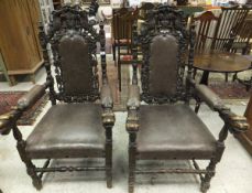 A pair of late 19th / early 20th Century hall chairs in the Carolean taste,