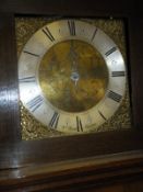 An oak longcase clock, the 30 hour movement striking on a bell,