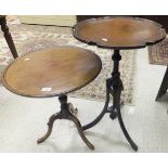 An Edwardian mahogany occasional table with pie-crust top raised on reeded and swept tripod base