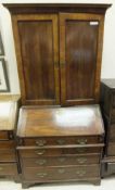 An 18th Century walnut bureau bookcase,