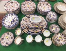 A large collection of ironstone china dinner and tea wares decorated in the Imari palette,