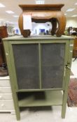 A green painted vintage meat safe,