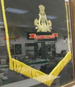 A framed and glazed Military School of Music velvet pennant with tassels