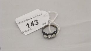 A 19th Century three stone diamond memento mori ring inscribed "....