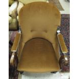 A 19th Century rosewood tub chair, the show wood scrolling arms with upholstered tops,