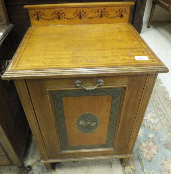 An Edwardian satinwood and painted coal purdonium in the Sheraton revival taste