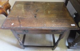 An oak and fruitwood single drawer side table on barley-twist supports in the 17th Century manner