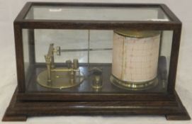 An early 20th Century oak cased barograph by T B Winter & Son, 21 Grey Street,