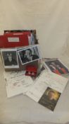 A box containing a large collection of autographed photographs and memorabilia to include Victoria