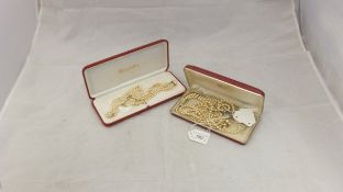 A red Majorica box containing a collection of pearl type jewellery to include a Majorica yellow