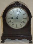 An early 20th Century mahogany cased dome-topped mantel clock,