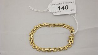 An 18 carat gold stylised gate-link bracelet,