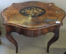 A Victorian walnut and marquetry inlaid single drawer centre table in the Louis XV taste