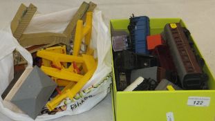 A box of various Dublo gauge rolling stock and locos, together with a bag of other Dublo ephemera,