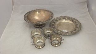 A collection of silver ware to include a sterling silver shallow dish with ornate pierced rim,