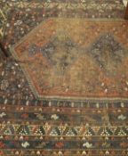 A collection of five rugs, to include a rug section in terracotta, dark blue and cream,