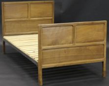A circa 1950 walnut single bedstead by Fred Gardiner (Provenance: Believed by the family to have