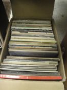 Four boxes of various LP records to include Genesis, Police, George Benson, Chris Rea,