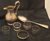 A collection of silver items to include silver baluster shaped jug with etched decoration,
