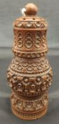 A carved baluster shaped betel nut pepper or pounce pot