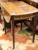 A 19th Century oval mahogany Pembroke table with satinwood inlay,