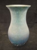 A Compton Pottery blue / turquoise glazed baluster vase with flared rim,