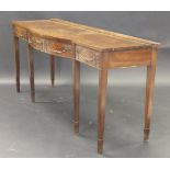 A George III mahogany breakfront serving table in the Adam taste, with applied harebell,