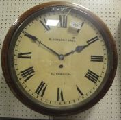 A Victorian walnut framed circular wall clock,