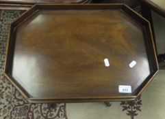 An Edwardian mahogany work table,