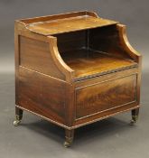 An 18th Century mahogany commode with three quarter galleried lift up top above lift top seat,