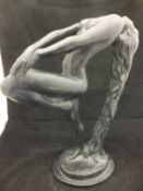 An Austin Products glazed pottery figure of a nude in the Art Deco manner AFTER SEVER and dated