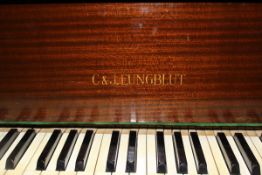 An early 20th Century mahogany cased baby grand piano,