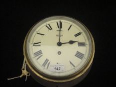 An early to mid 20th Century Smith's "Astral" wall clock in brass casing