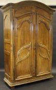 A late 18th / early 19th Century French walnut armoire,