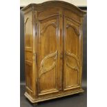 A late 18th / early 19th Century French walnut armoire,