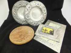 Two Liberty style embossed pewter plates,