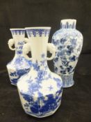 A Chinese porcelain baluster shaped vase decorated in blue and white with butterflies and scrolling